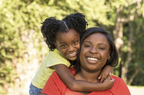 Smiling child and mother